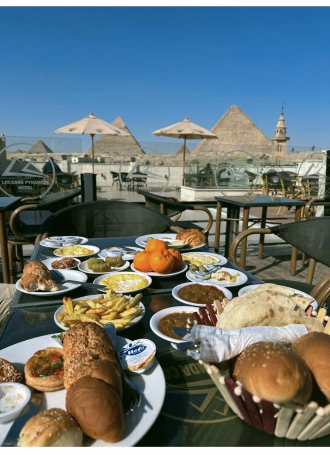 Locanda Pyramids Hotel Kafret el-Gabal المظهر الخارجي الصورة